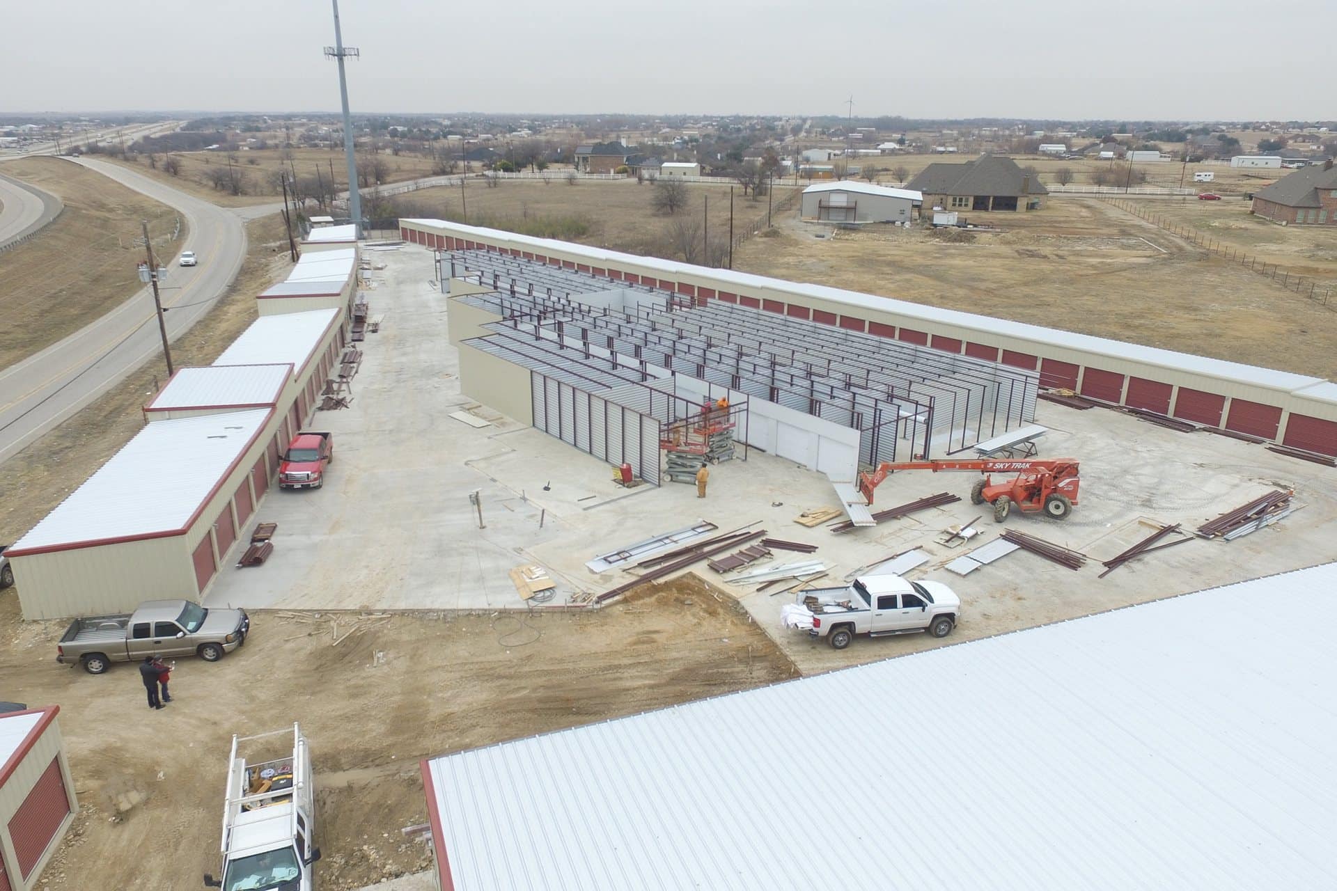 self storage facility under construction roll up doors and framing