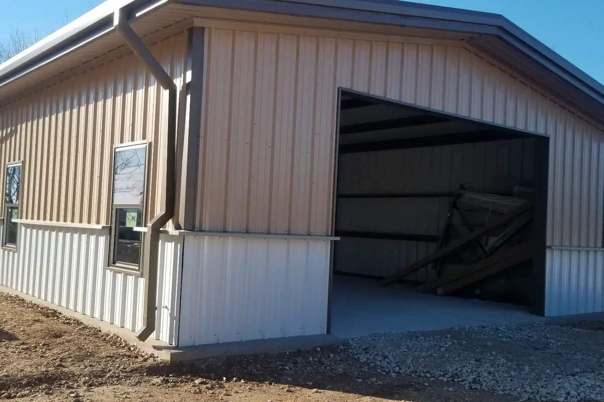 small commercial shop white metal single bay exterior
