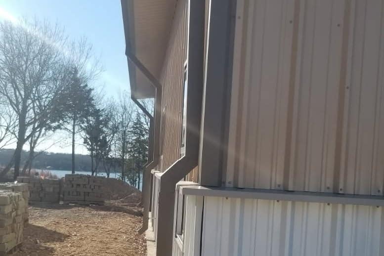 exterior detail downspout wainscot transition lakeside