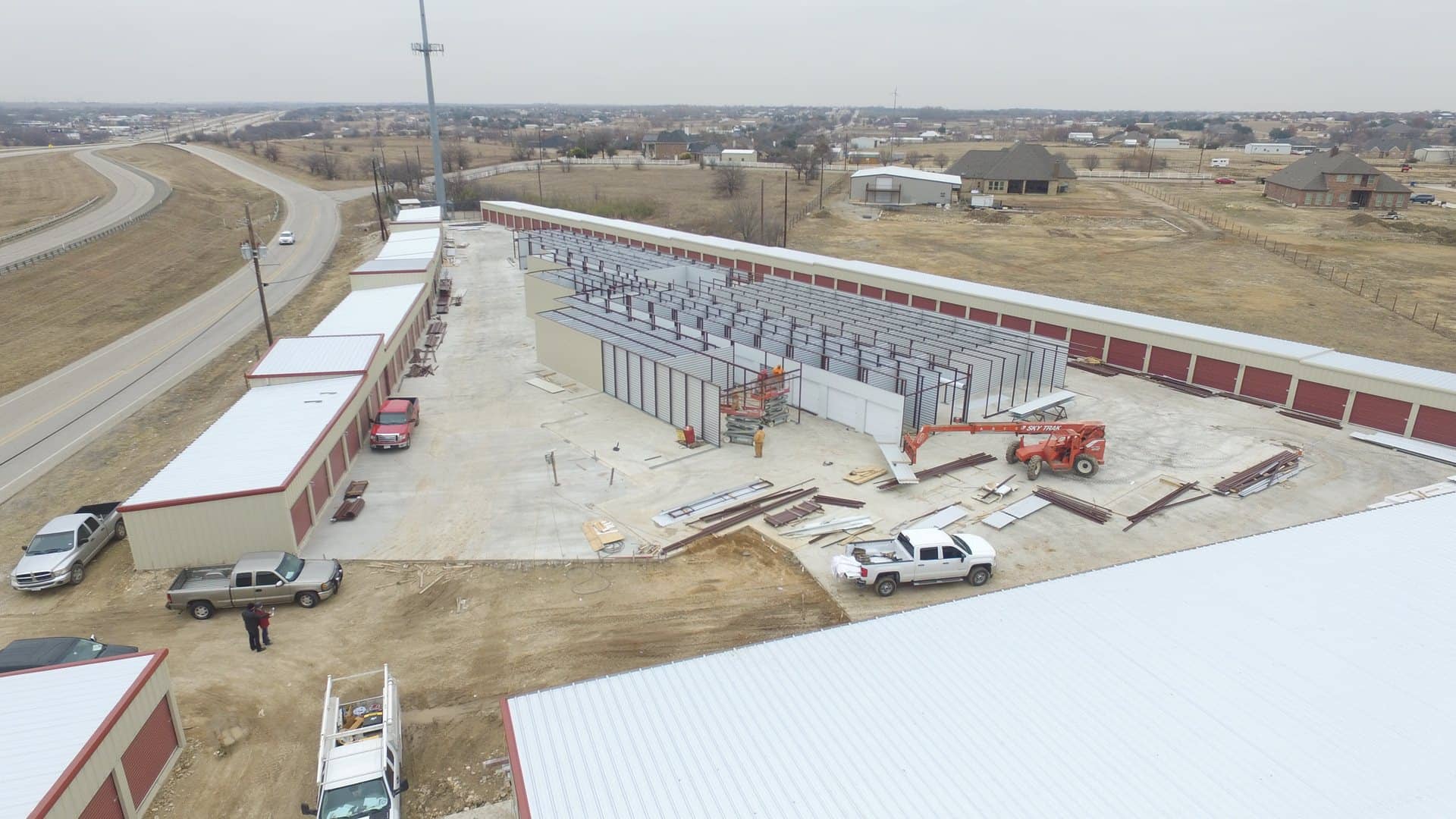 self storage facility under construction roll up doors and framing