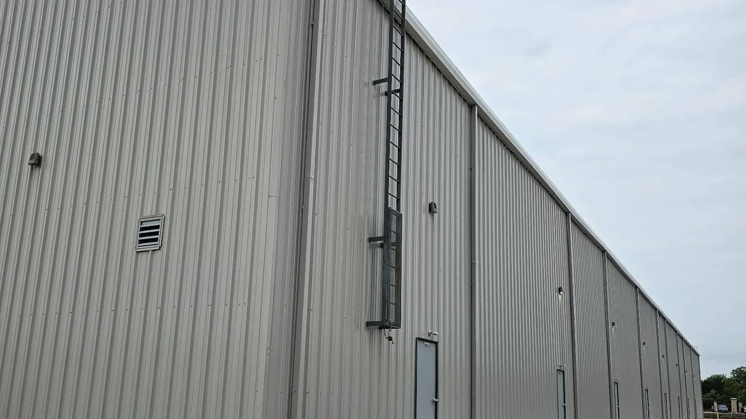 warehouse tall eave side elevation roof ladder